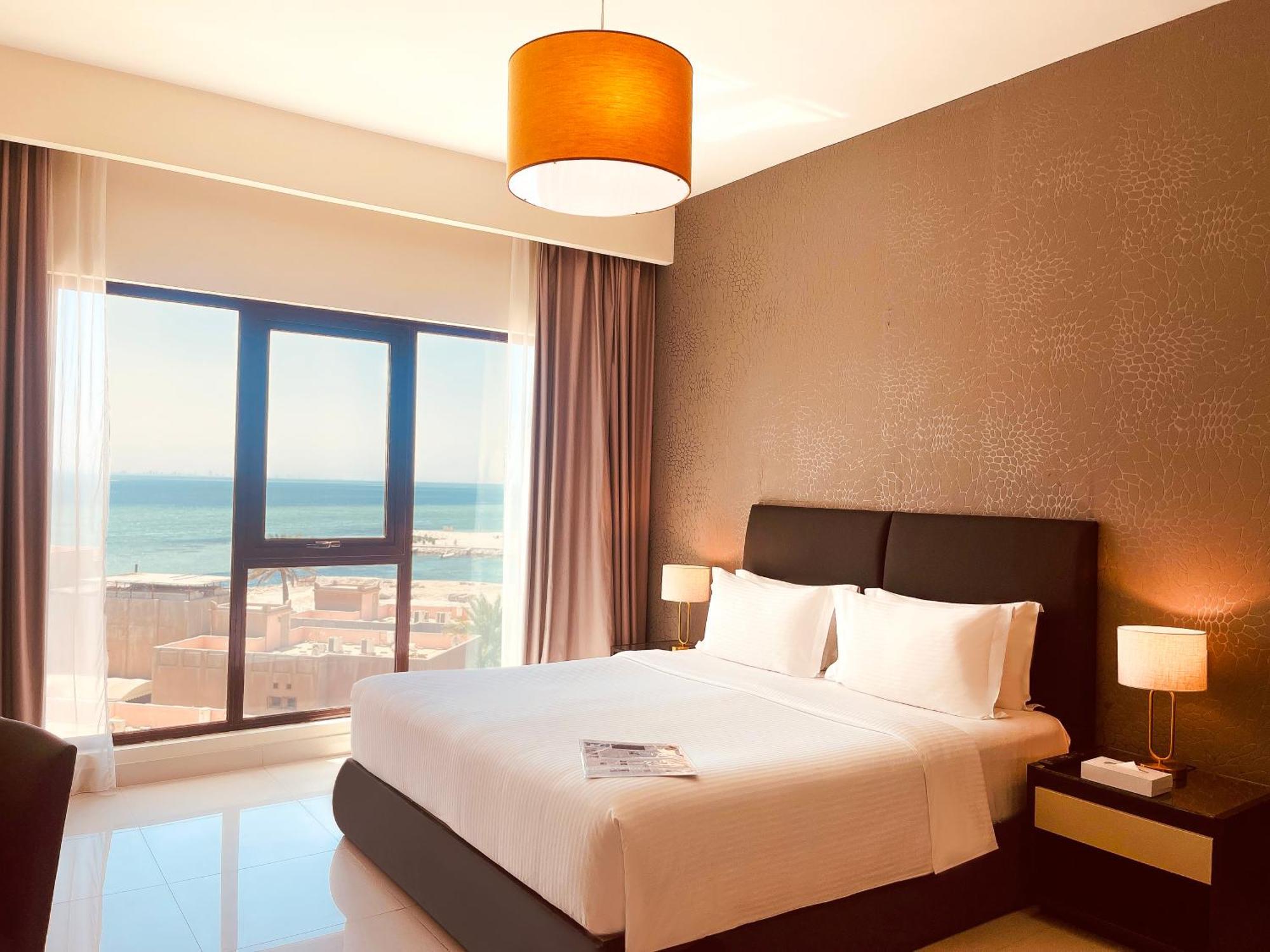 Lagoona Beach Luxury Resort And Spa Manama Ngoại thất bức ảnh A bedroom at the hotel